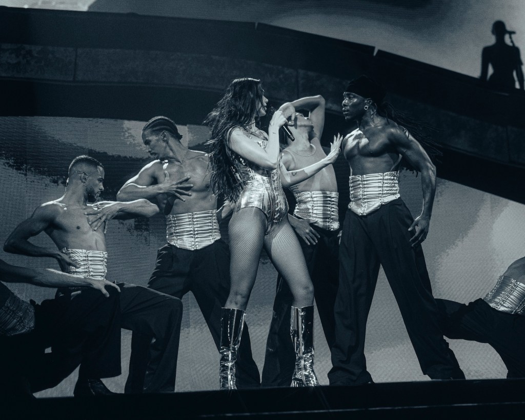 Dua Lipa on stage with dancers in Maimi.