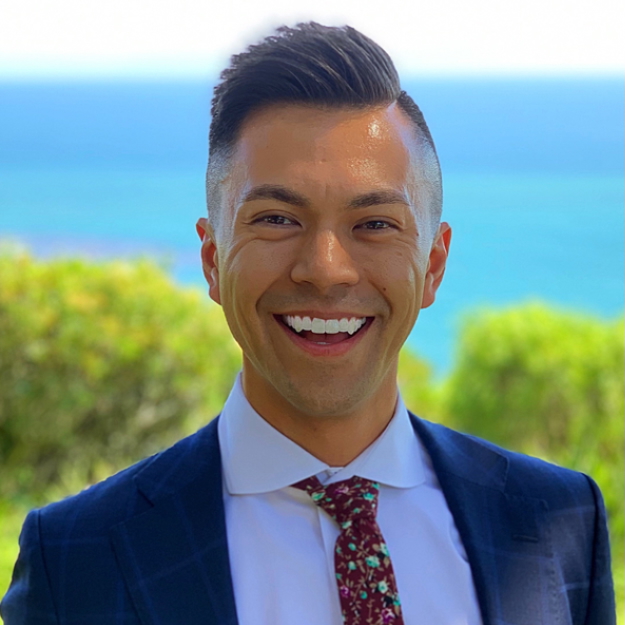 photo of a smiling man at the seaside