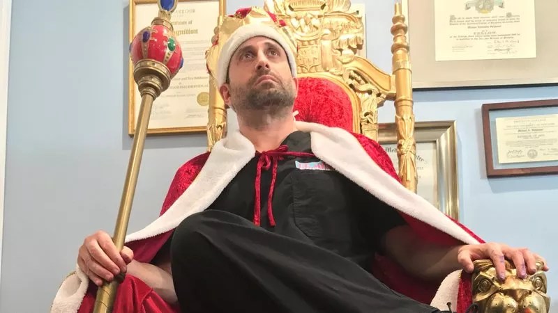 Video: Snapchat Surgeon Dr. Michael Salzhauer Interrupts Town Meeting to Declare Himself King