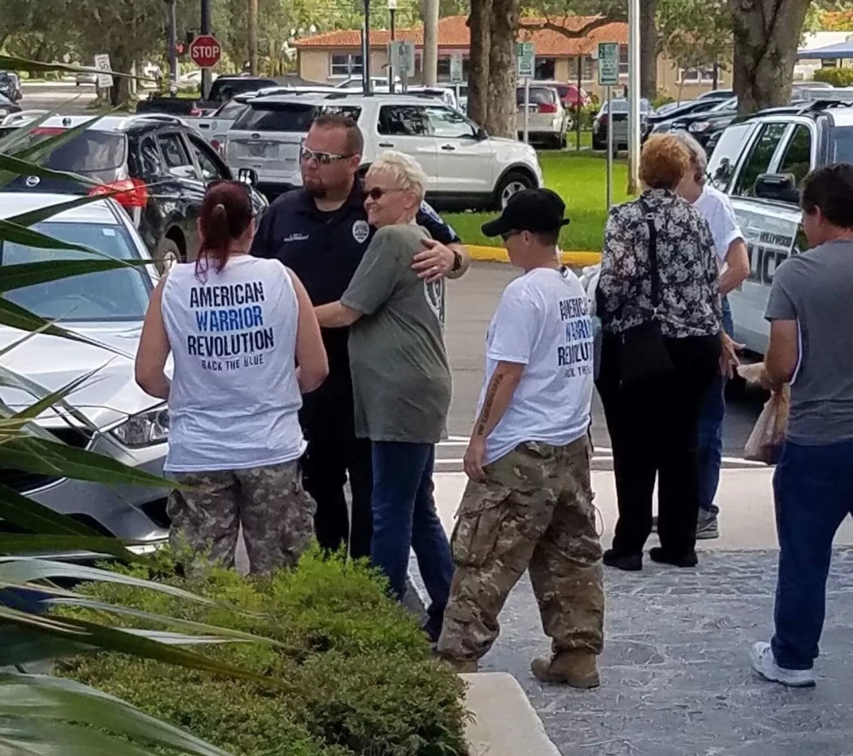 Hollywood Police Defend Cop Who Took Selfie Hugging Pro-Confederate Street Sign Protesters UPDATED