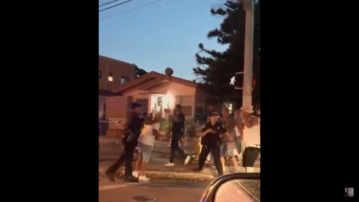 Here’s Video of Cops Breaking Up a Calle Ocho Fight (and Grabbing a Man by the Neck)