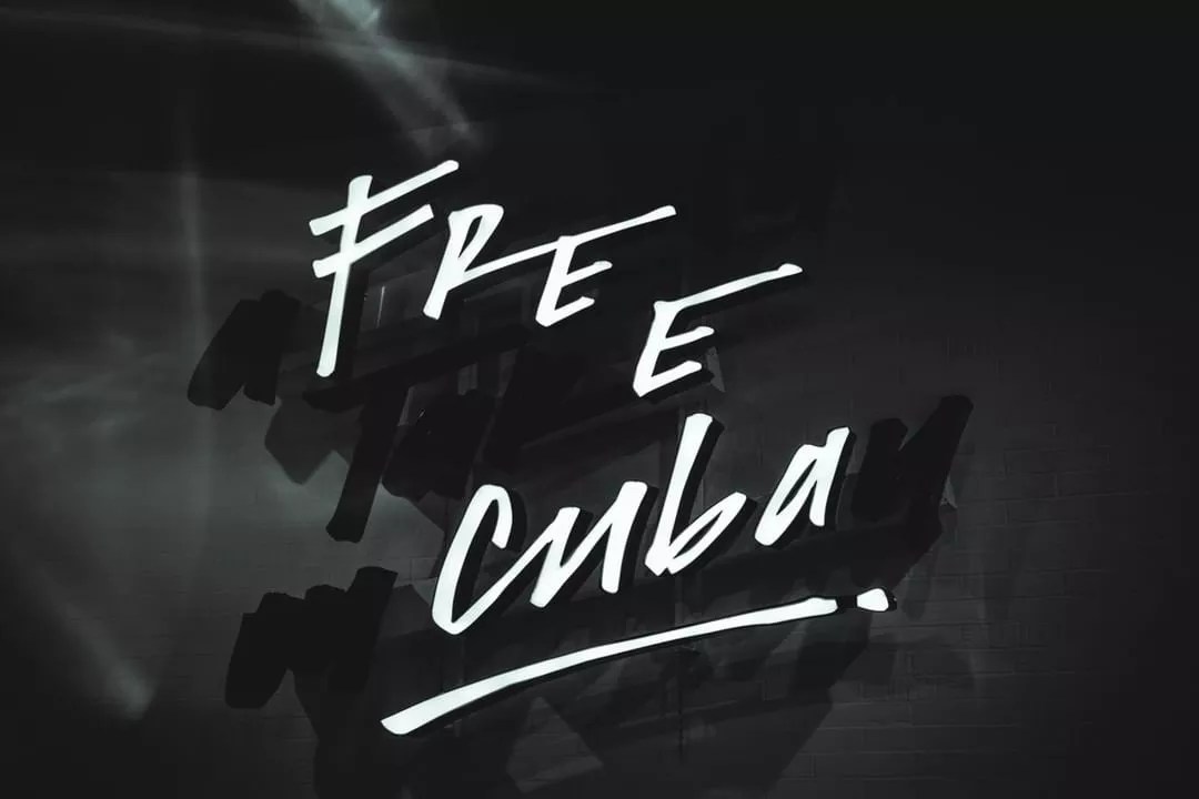 Artist Camilo Rojas Designs “Free Cuba” Sign for Sergio’s Cuban