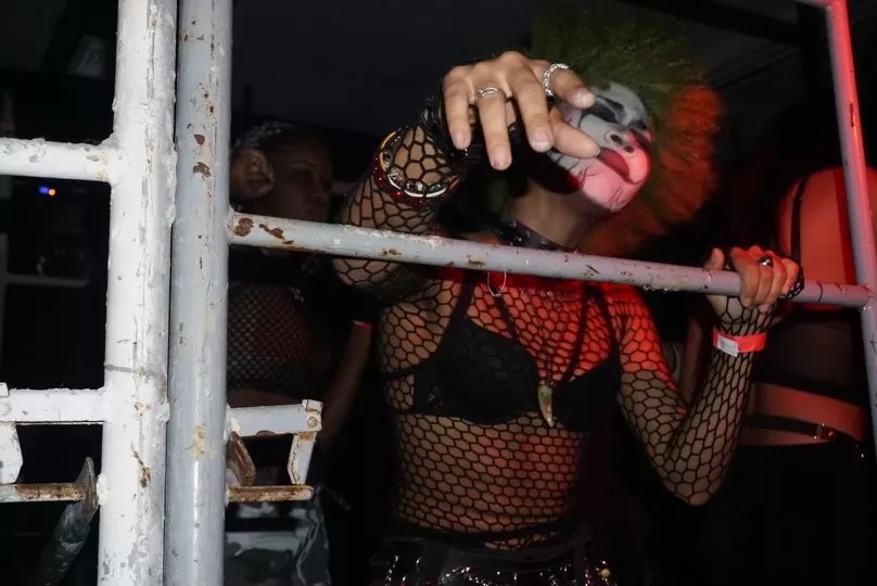 Picture of a goth woman dancing.