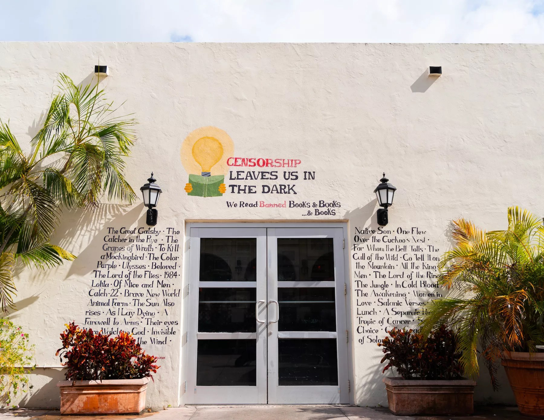 photo of a mural listing dozens of titles of famous books that have been banned