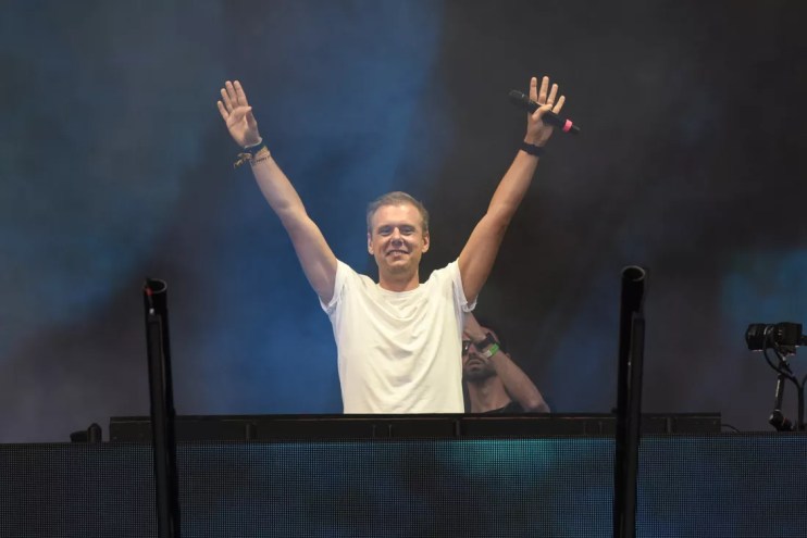 DJ Armin van Buuren with his hands raised up at Ultra Music Festival in Miami