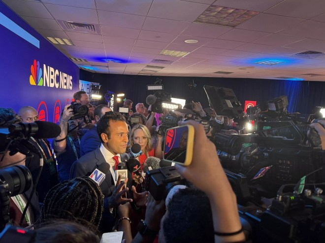 Vivek Ramaswamy speaks with reporters at the Miami debate