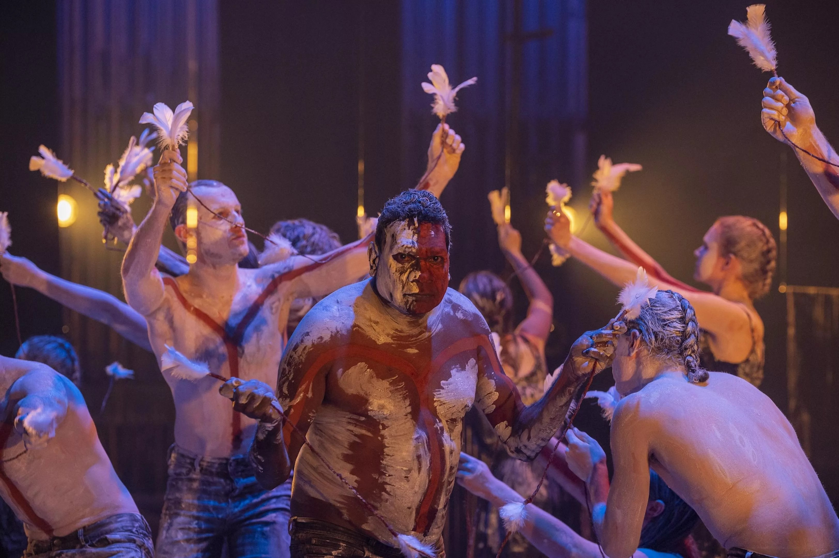 Australian aboriginal artist Banula Marika surrounded by dancers