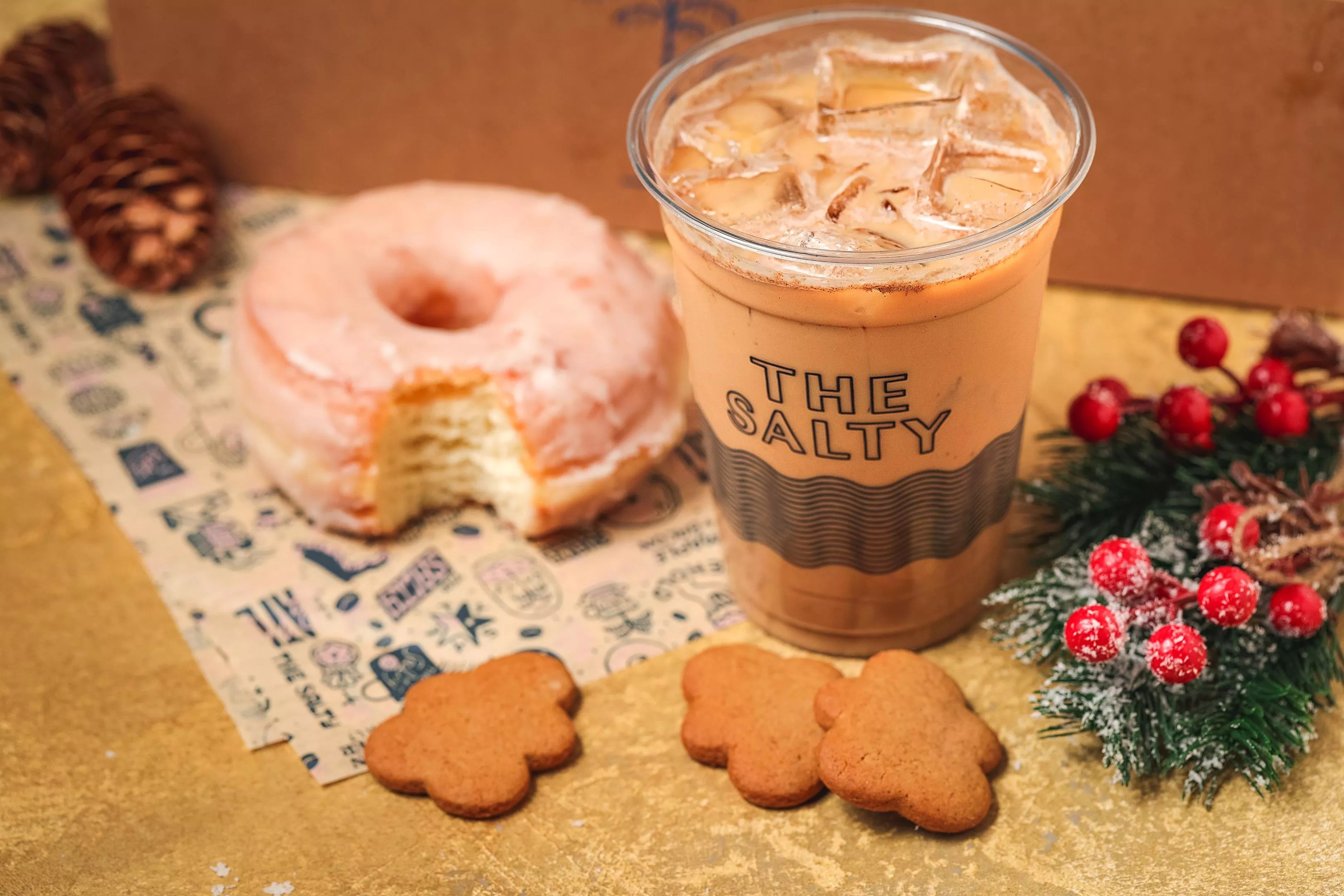 A classic glazed doughnut and an iced coffee from The Salty