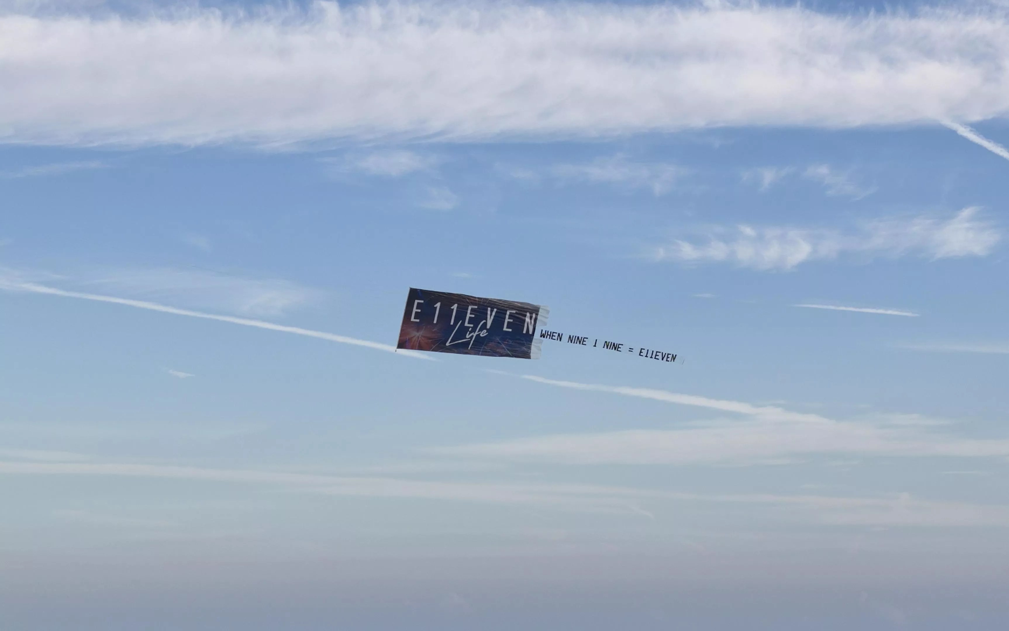 E11even's fly banner reads, "When Nine 1 Nine = E11even"
