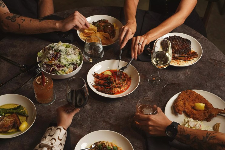 Hands grabbing a meal