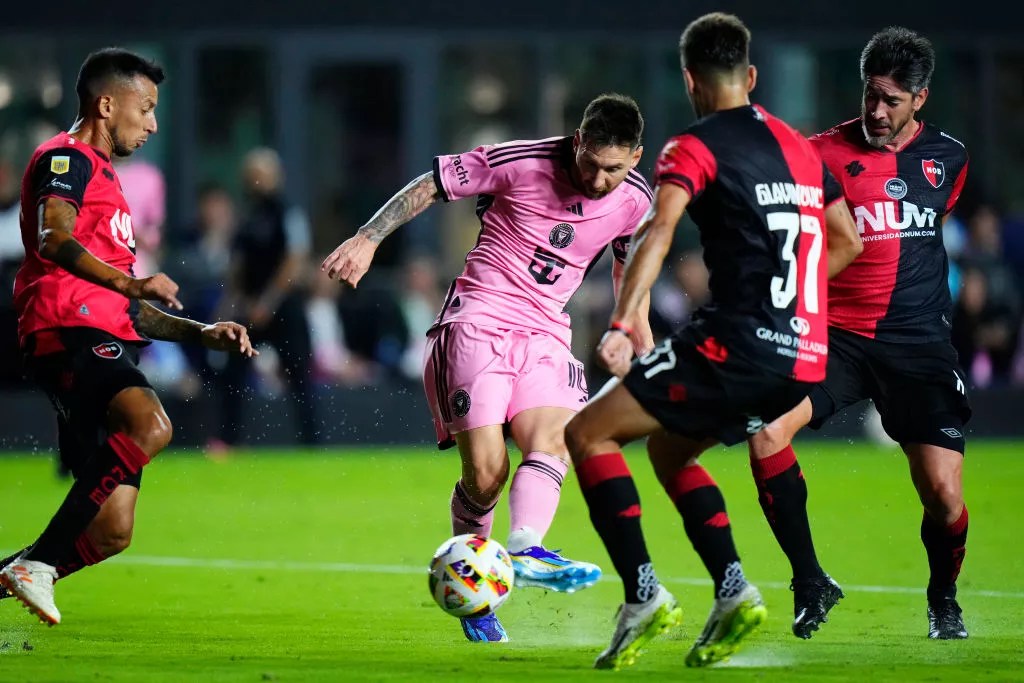 Soccer legend Lionel Messi shoots the ball during a home game against Newell's Old Boys