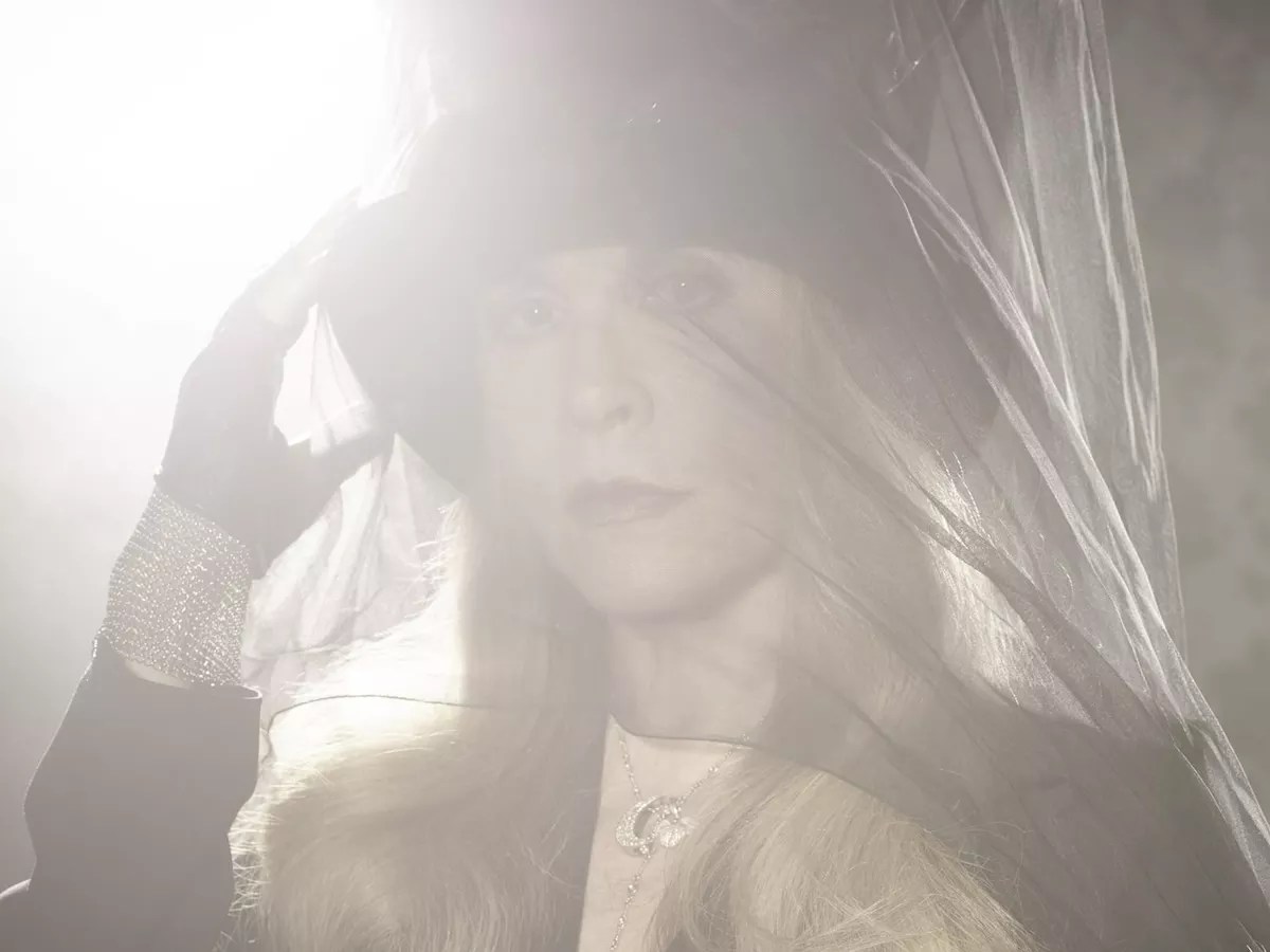 Stevie Nicks wearing a hat and veil