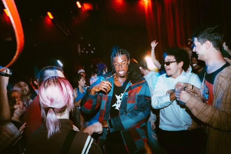 A crowd of young people dancing