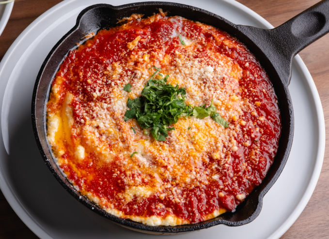Bar Luca's Eggs in Purgatory served in a cast-iron pan