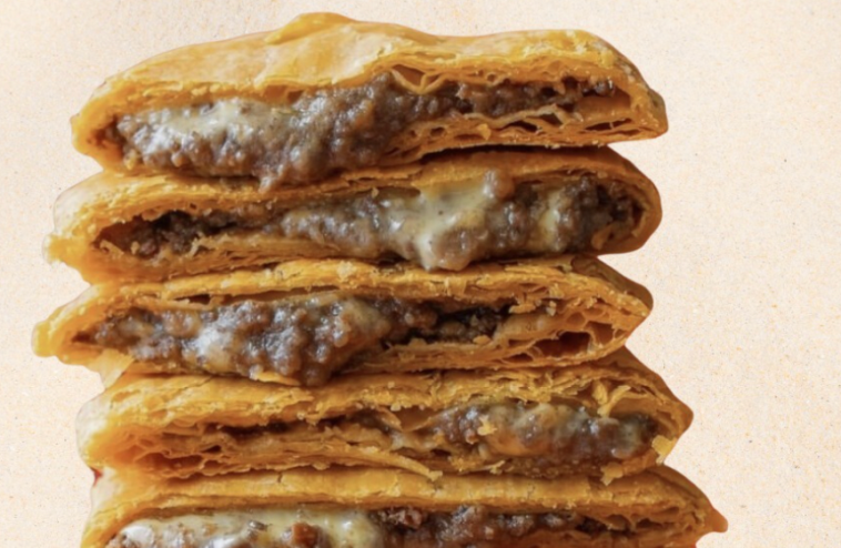 Jamaican patties stacked on each other