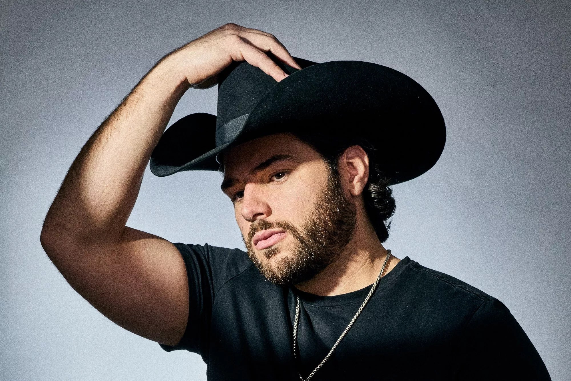 Orlando Mendez in a black cowboy hat