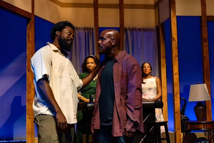 Jean Hyppolite, Carey Brianna Hart, Charles Reuben, and Dina Lewis on stage in Bourbon at the Border