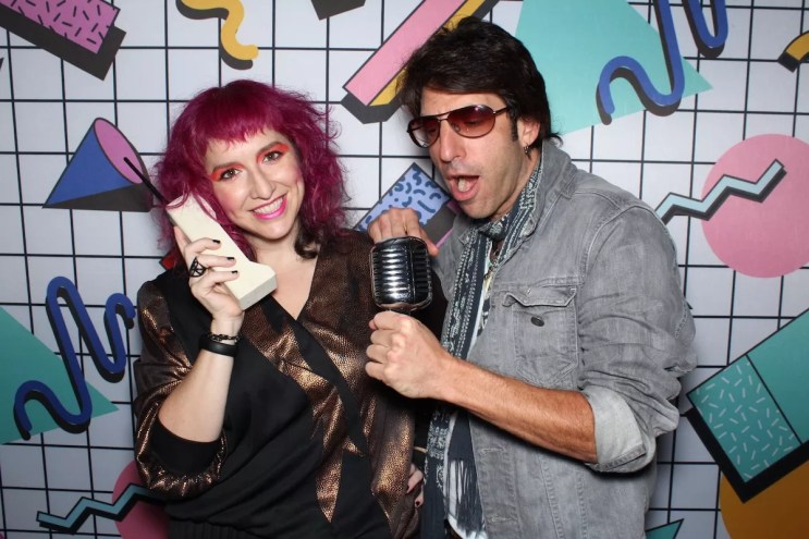 Lolo Reskin and Carmel Ophir in the photo booth at '80s Prom