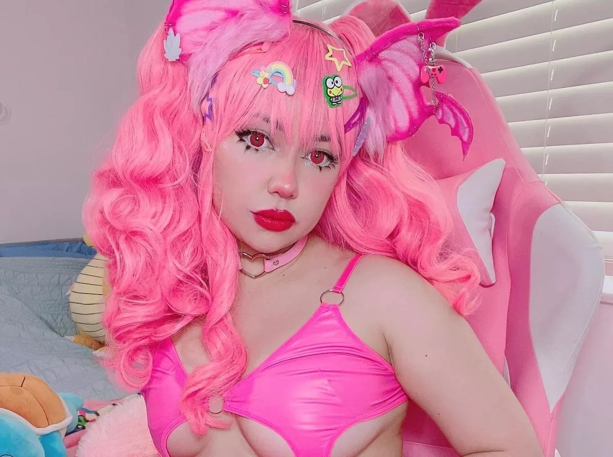 Kirbii Casablancas in a pink wig and pink bikini top