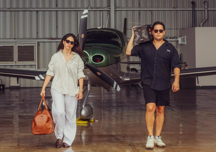 Two people at a distillery