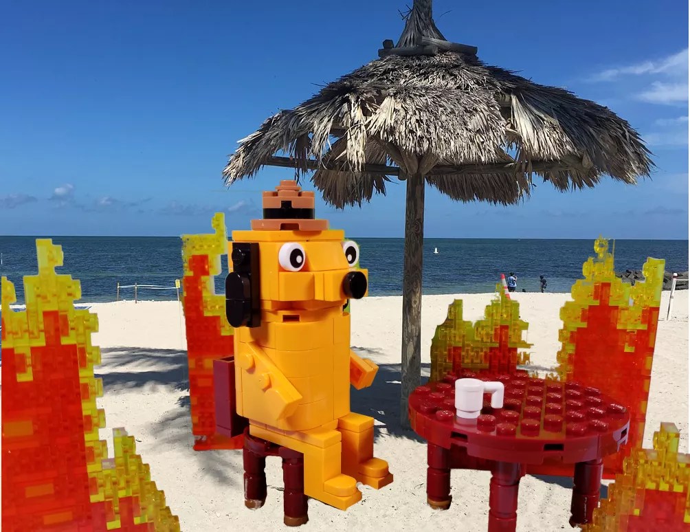 Lego and seaside play on the K.C. Green "This is Fine" meme