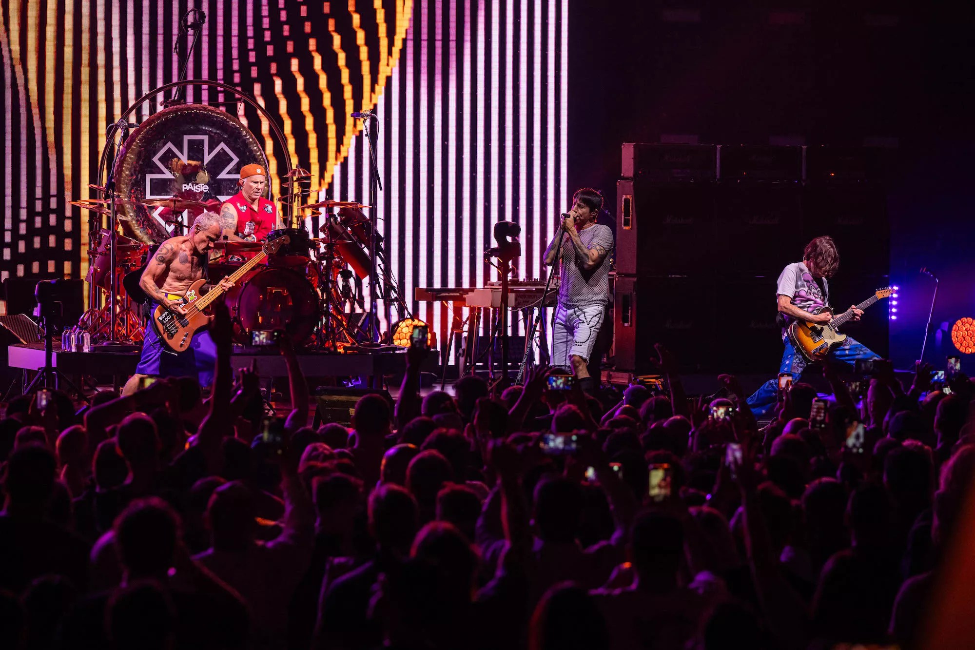 Red Hot Chili Peppers performing on stage at Hard Rock Live