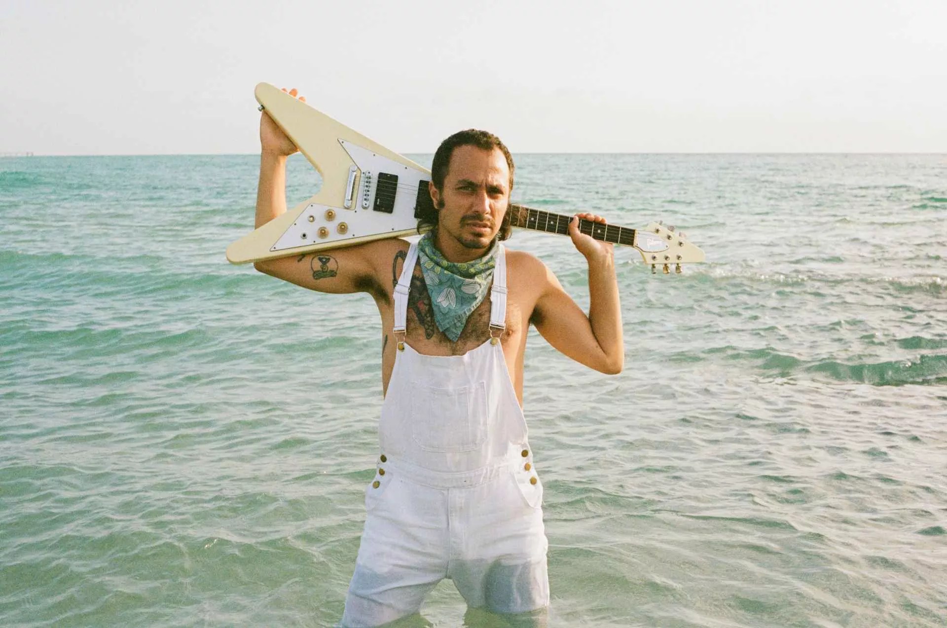 Portrait of Ben Katzman with his guitar