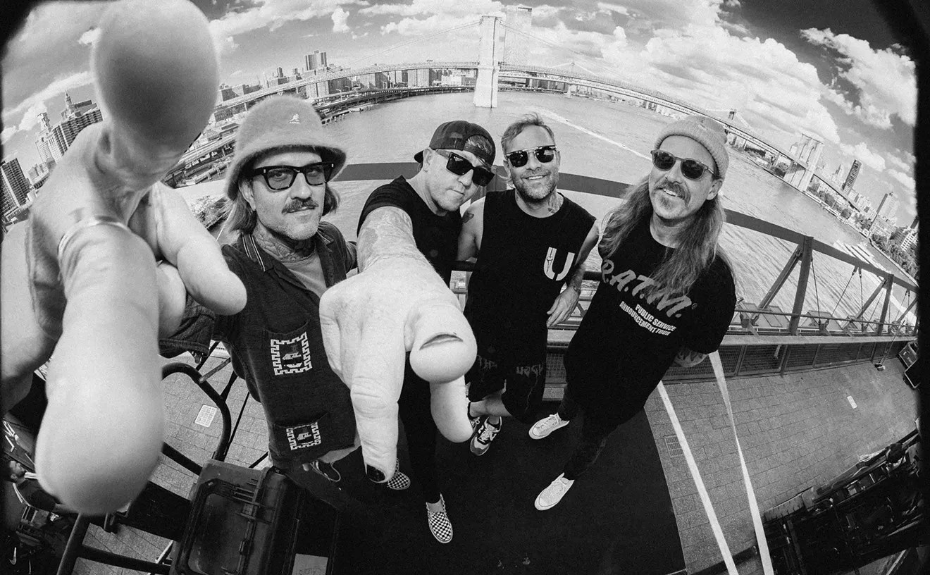 Portrait of the band members of the Used