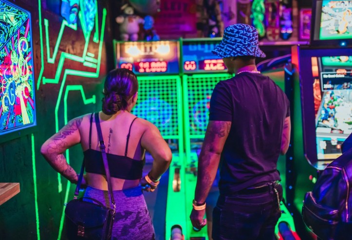 A couple playing a game at Glitch Bar in Fort Lauderdale
