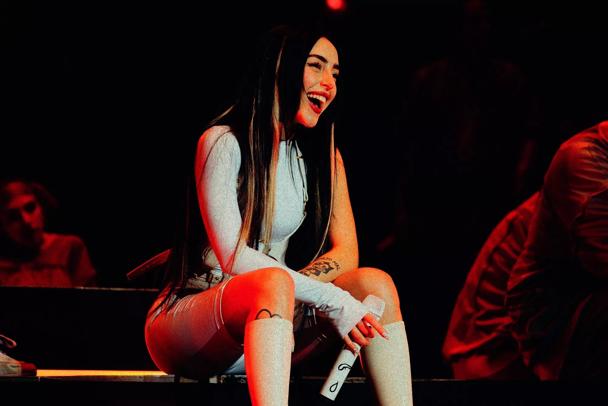 Nicki Nicole performing on stage