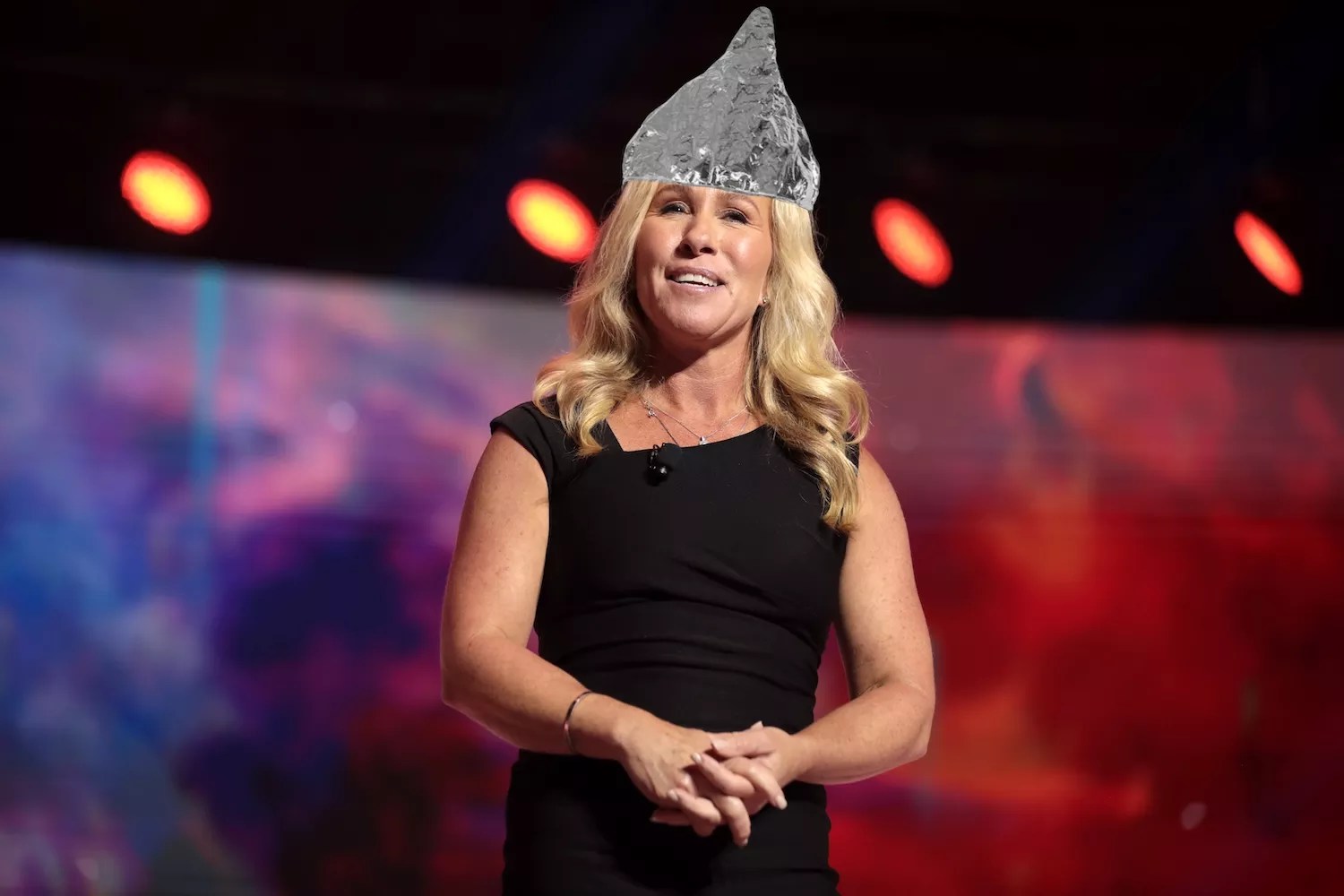 photo of Marjorie Taylor Greene with a tinfoil hat photoshopped atop her noggin