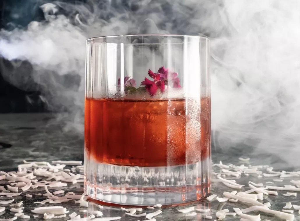 a cocktail with smoke