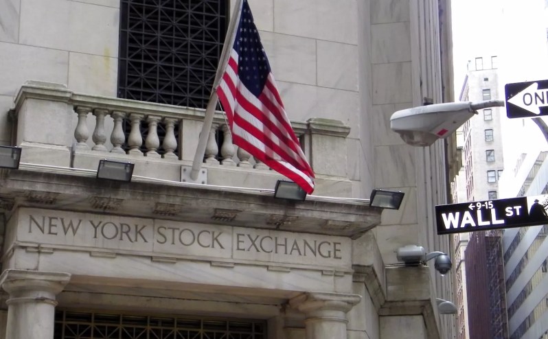 photo of an entrance to the New York Stock Exchange headquarters on Wall Street