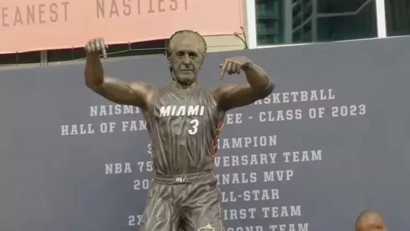 Illustration of Pat Riley's face on Dwyane Statue