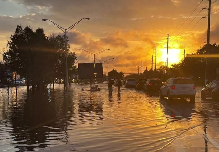 Photo of the sun rising over waterlogged Broward County after a night of historic rain.