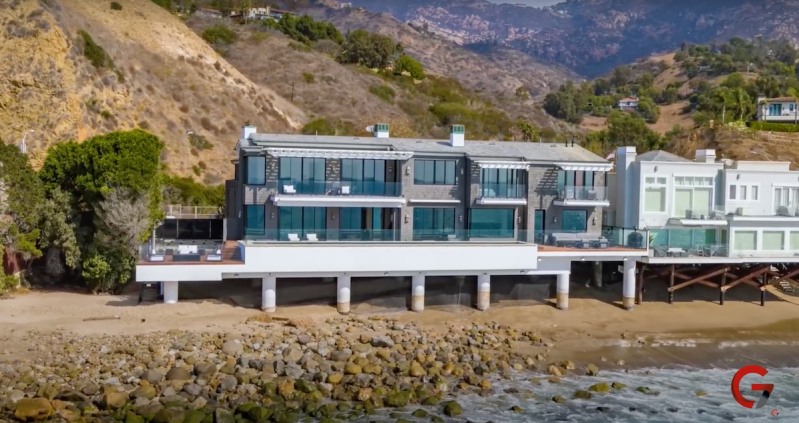 photo of a large beachfront mansion