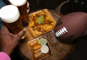 hands and beer and football