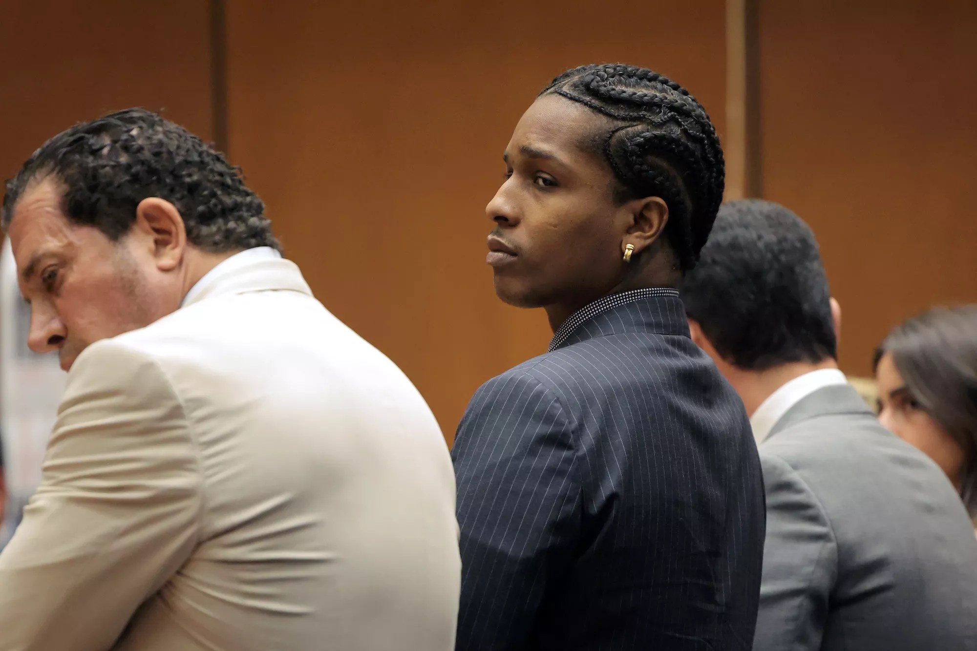 A$AP Rocky standing in a Los Angeles courtroom awaiting the verdict