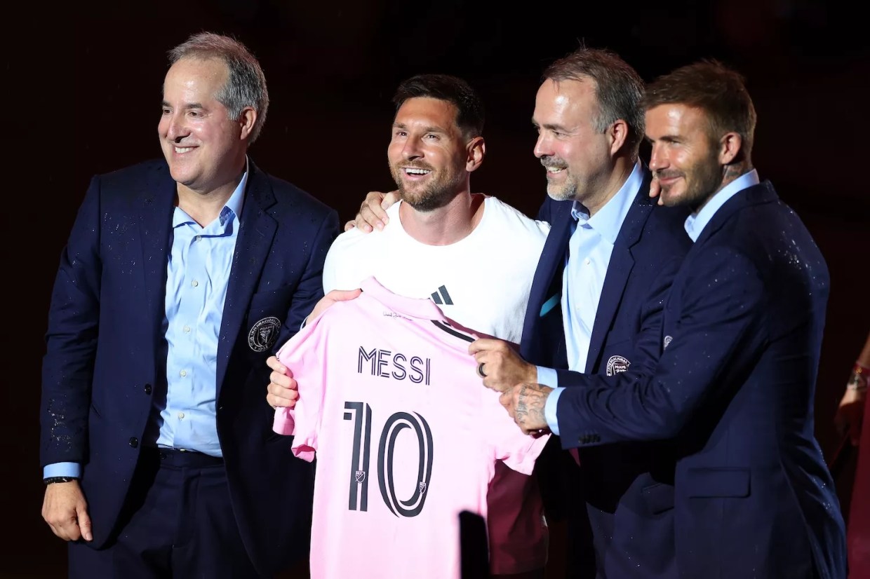 Left to right: Managing owner Jorge Mas, Lionel Messi, co-owner José Mas, and co-owner David Beckham pose during "The Unveil" introducing Lionel Messi hosted by Inter Miami CF at DRV PNK Stadium in Fort Lauderdale, Florida, on July 16, 2023