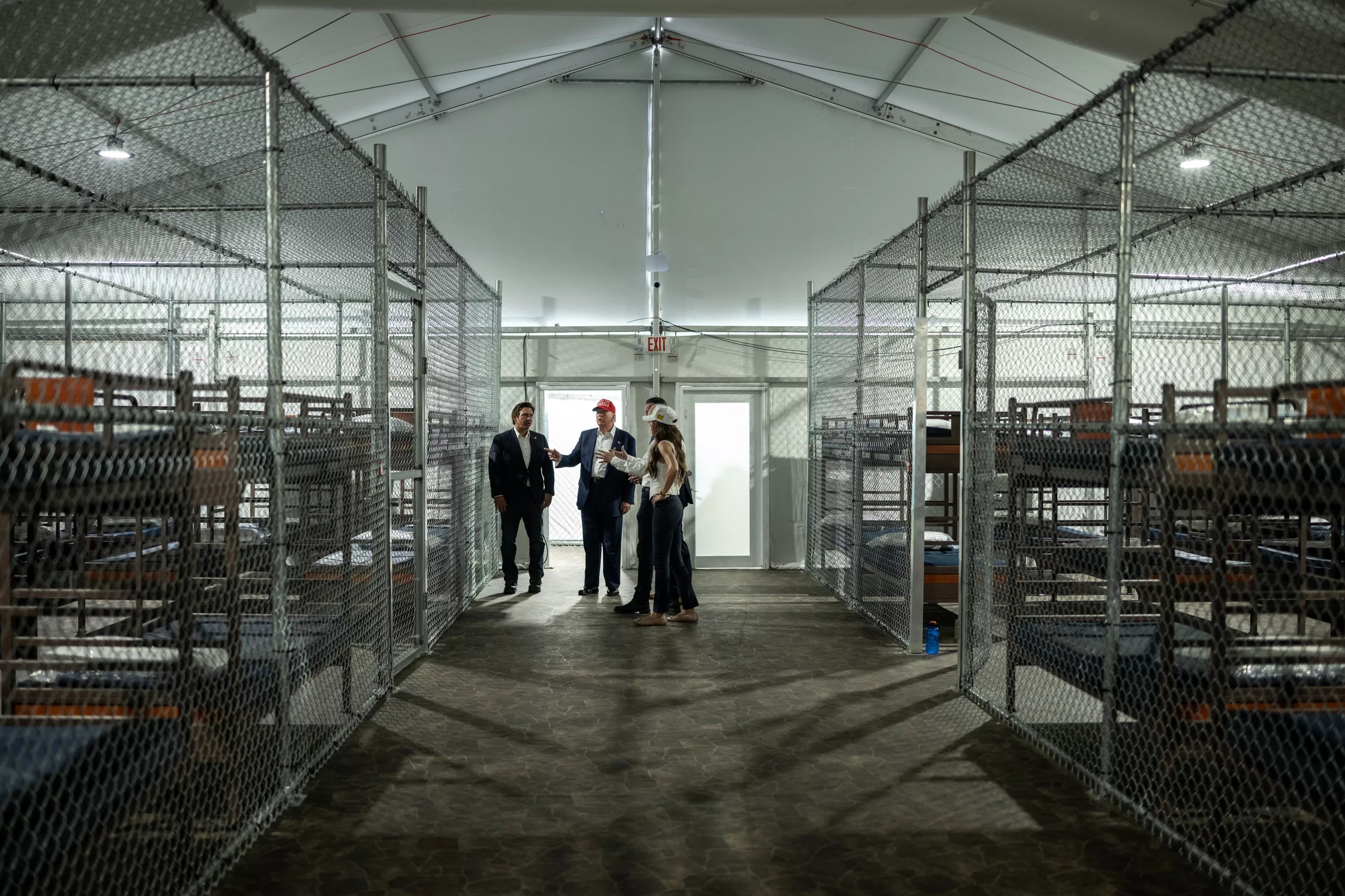 President Donald Trump participates in a walking tour of the immigration detention center, Alligator Alcatraz.