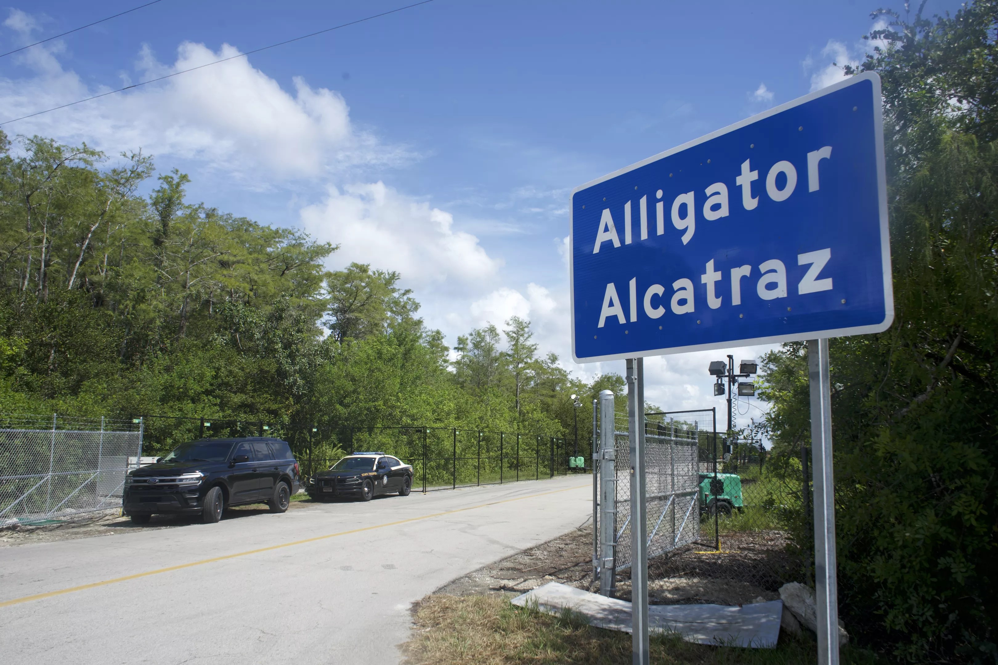 The "Alligator Alcatraz" sign.