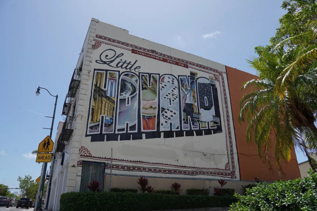 a mural on Miami's Calle Ocho reads, "Welcome to Little Havana"