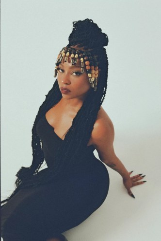 Portrait of a black woman wearing a golden crown