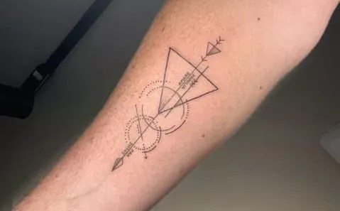 a fine-line tattoo on a forearm