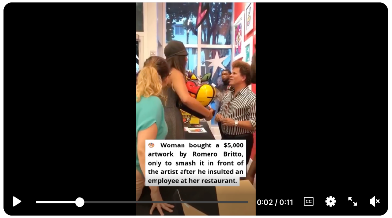 Screenshot of a video showing a standoff between a woman and artist Romero Britto. Text overlayed on the video reads, "🎨 Woman bought a $5,000 artwork by Romero Britto, only to smash it in front of the artist after he insulted an employee at her restaurant."
