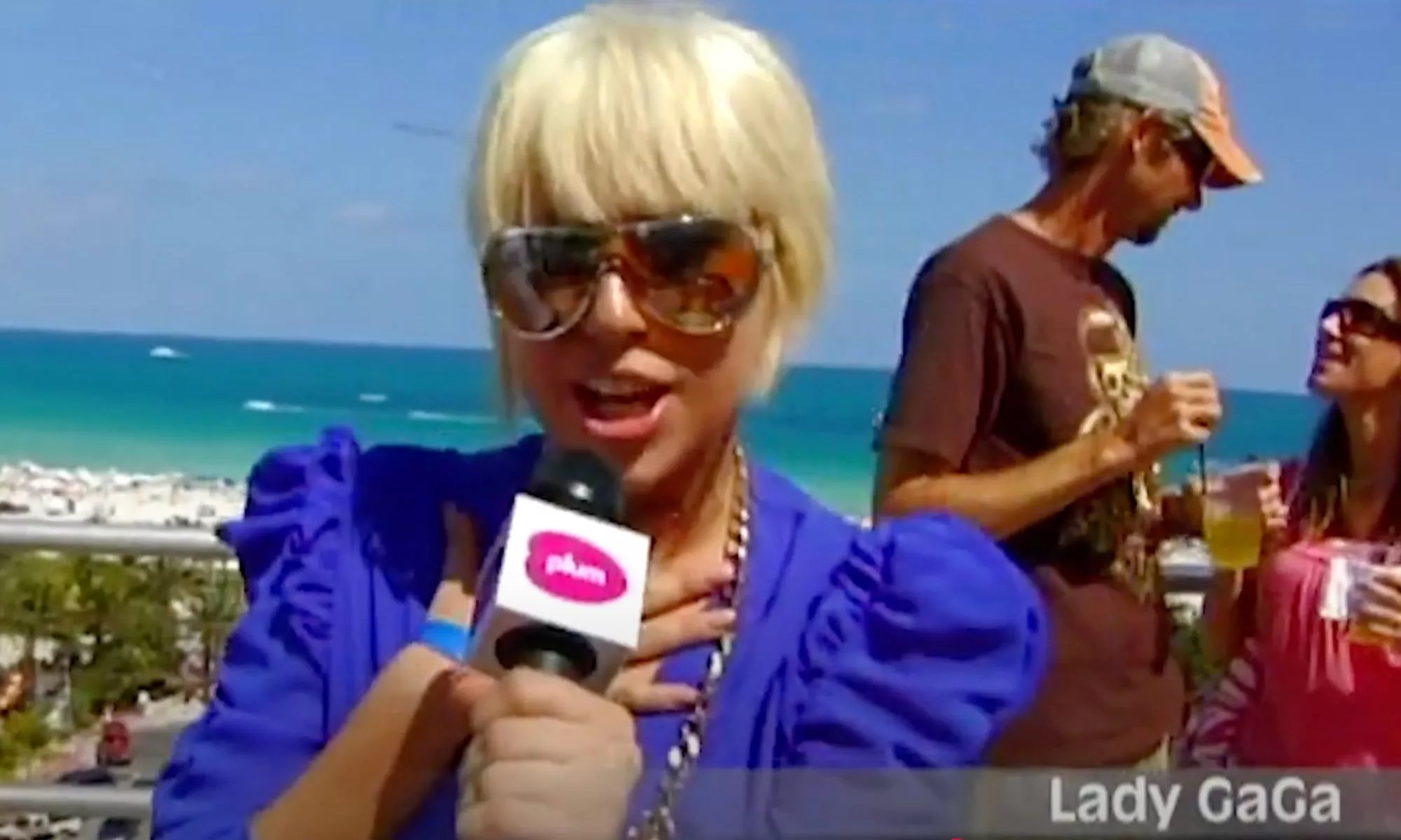 Picture of a young Lady Gaga giving an interview.